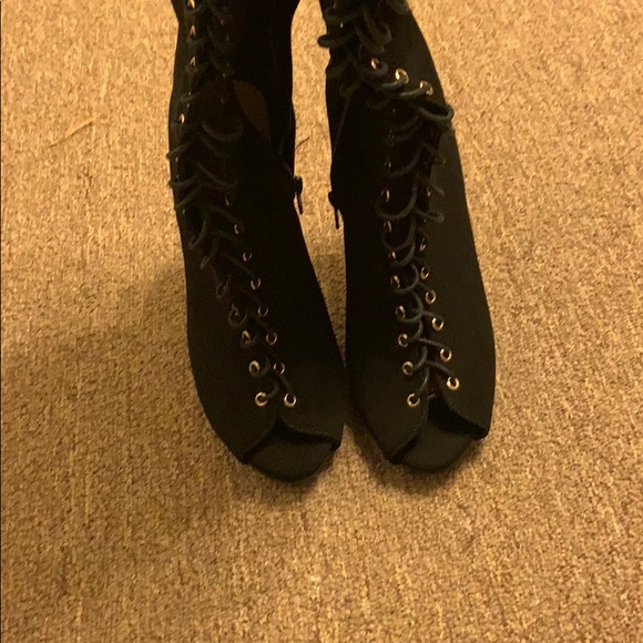 Thigh high boots, lace up
